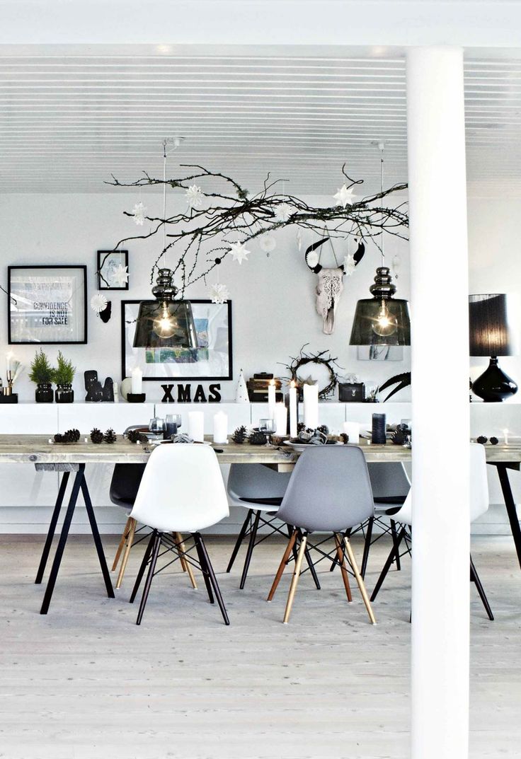 Holiday dining room with branch chandelier and ornaments
