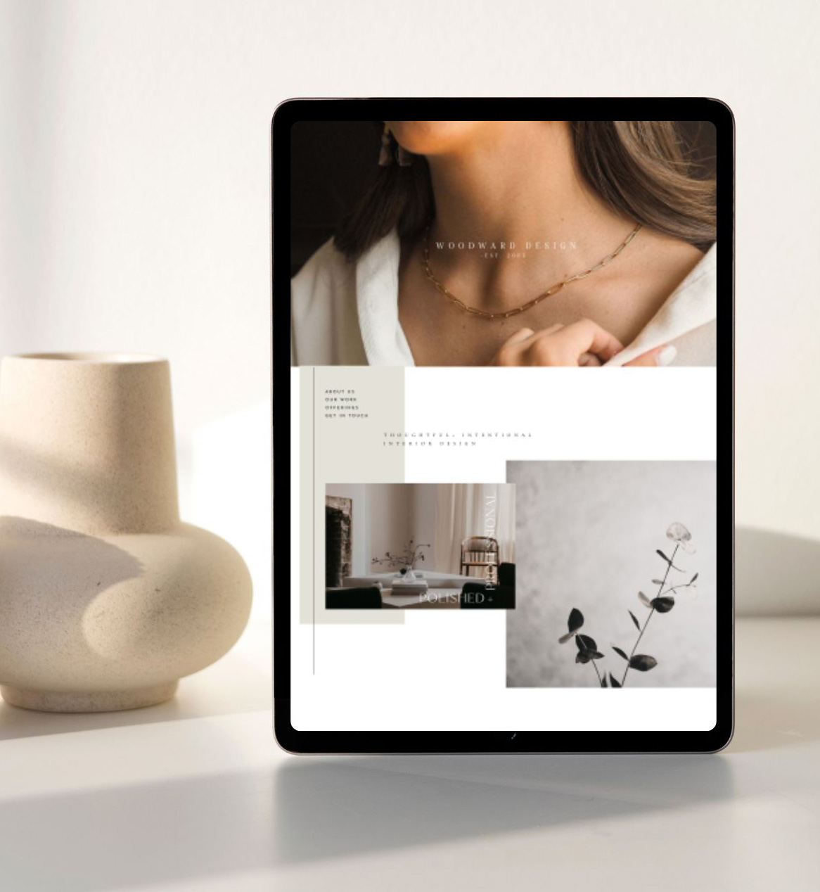 ipad mockup of Woodward Design Showit template with white background and urn