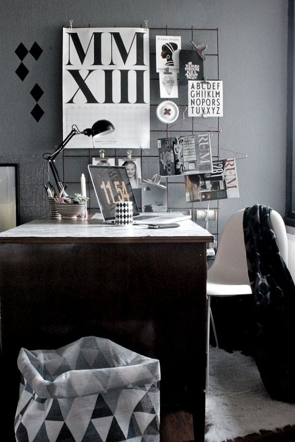 Close up of modern craft room with wire frame and black and white collage over it