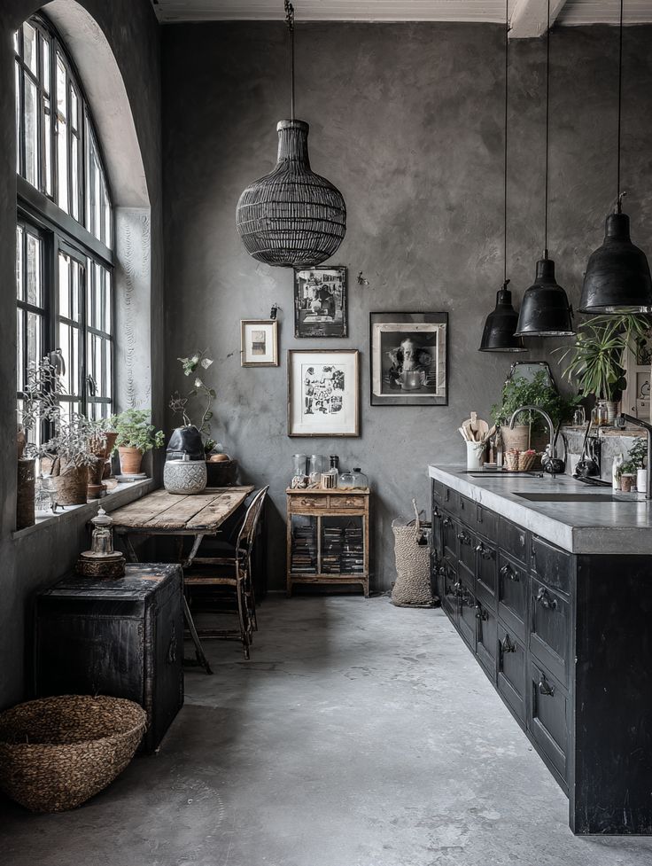 An image illustrating the "pockets of light" technique in a moody kitchen, showing how brass hardware and warm lamp lighting add a sophisticated, lived-in feel.